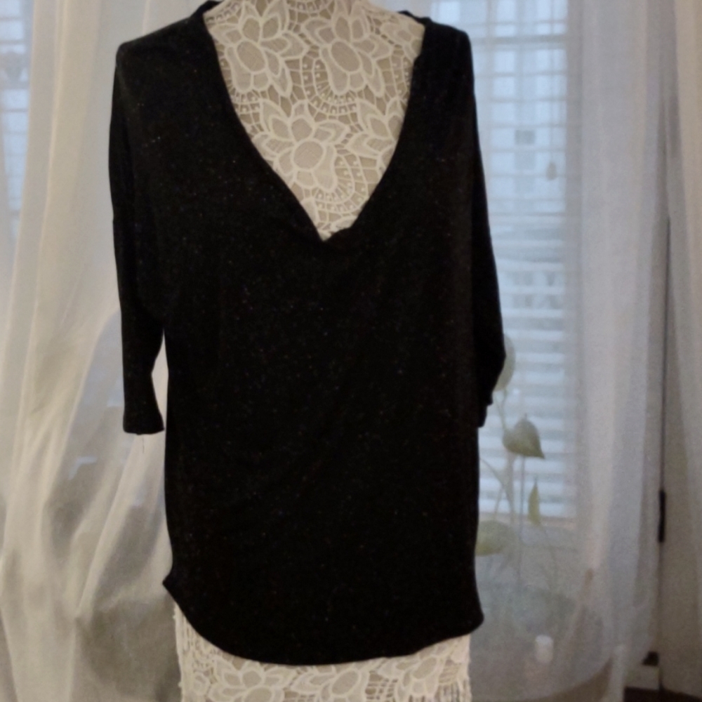 Larry Levine black and white top with Dolman sleeves, size M